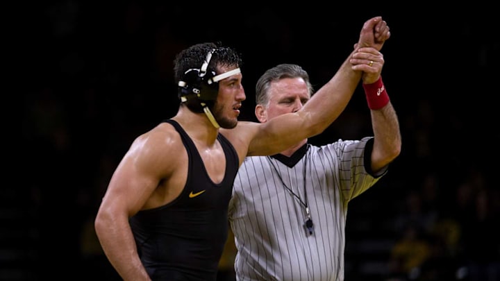 Iowa’s Michael Kemerer celebrates his win against Oklahoma State’s Joe Smith at 174 pounds during the Hawkeye’s last home dual of the season, on Sunday, Feb. 23, 2020, in Carver Hawkeye Arena.0223 Iowawr 020 Cr2