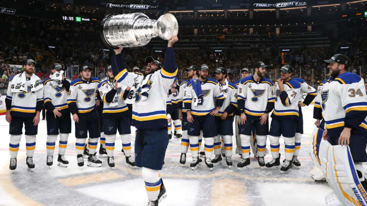 Robby Fabbri #15 of the St. Louis Blues hoists the Stanley Cup