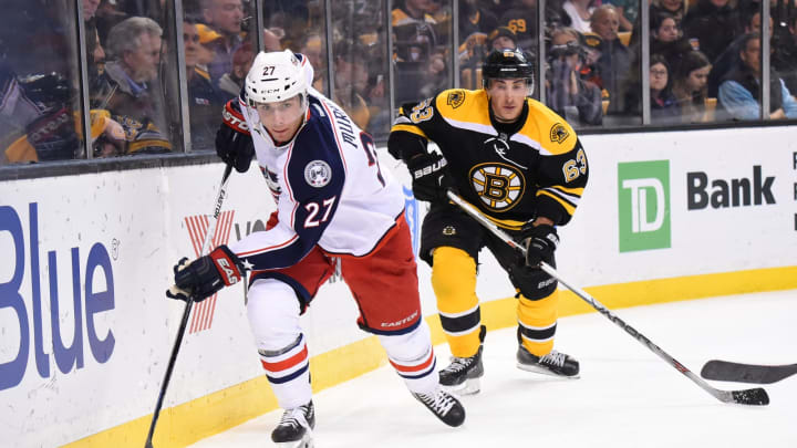 BOSTON, MA - FEBRUARY 22 : Ryan Murray #27 of the Columbus Blue Jackets skates against Brad Marchand #63 of the Boston Bruins at the TD Garden on February 22, 2016 in Boston, Massachusetts. (Photo by Brian Babineau/NHLI via Getty Images)