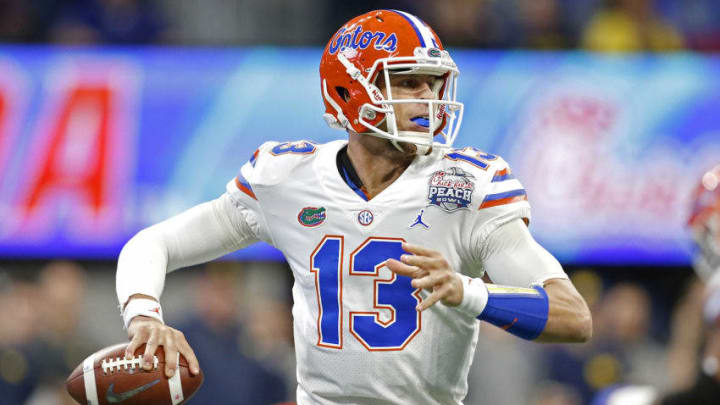 ATLANTA, GEORGIA - DECEMBER 29: Feleipe Franks #13 of the Florida Gators looks to pass against the Michigan Wolverines in the first quarter during the Chick-fil-A Peach Bowl at Mercedes-Benz Stadium on December 29, 2018 in Atlanta, Georgia. (Photo by Mike Zarrilli/Getty Images)