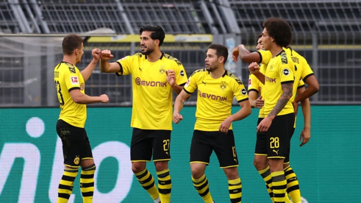 DORTMUND, GERMANY - JUNE 06: Emre Can of Borussia Dortmund celebrates scoring his teams first goal of the game with team mates during the Bundesliga match between Borussia Dortmund and Hertha BSC at Signal Iduna Park on June 06, 2020 in Dortmund, Germany. (Photo by Lars Baron/Getty Images)