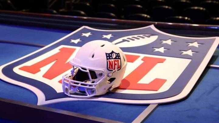 May 8, 2014; New York, NY, USA; A general view of a helmet and NFL shield logo before the start of the 2014 NFL Draft at Radio City Music Hall. Mandatory Credit: Adam Hunger-USA TODAY Sports