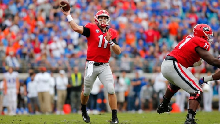 JACKSONVILLE, FL - OCTOBER 27: Georgia Bulldogs quarterback Jake Fromm (11) throws a touchdown pass during the game between the Florida Gators and the Georgia Bulldogs on October 27, 2018 at TIAA Bank Field in Jacksonville, Fl. (Photo by David Rosenblum/Icon Sportswire via Getty Images)