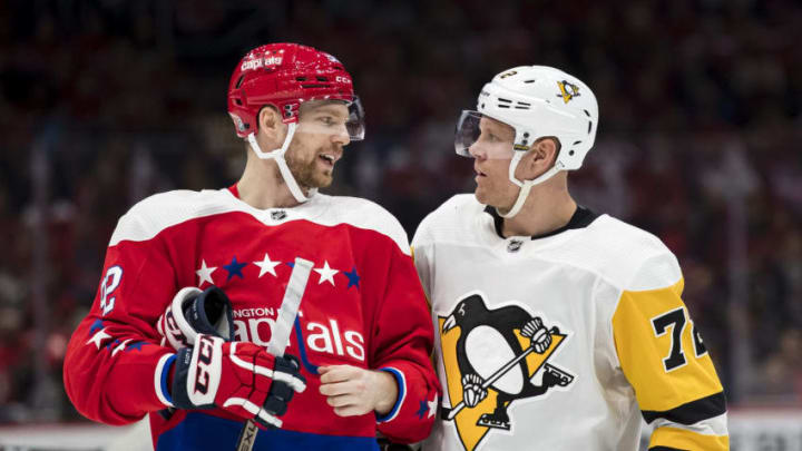 WASHINGTON, DC - FEBRUARY 02: Evgeny Kuznetsov #92 of the Washington Capitals speaks with Patric Hornqvist #72 of the Pittsburgh Penguins during the third period at Capital One Arena on February 2, 2020 in Washington, DC. (Photo by Scott Taetsch/Getty Images)