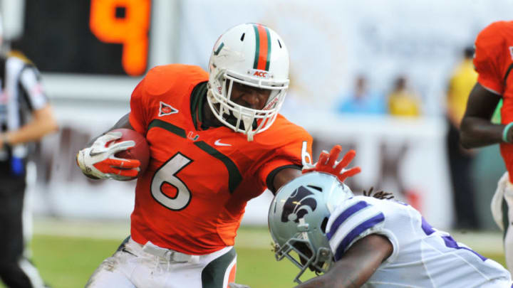 MIAMI GARDENS, FL - SEPTEMBER 24: Running back Lamar Miller #6 of the Miami Hurricanes rushes upfield against the Kansas State University Wildcats September 24, 2011 at Sun Life Stadium in Miami Gardens, Florida. (Photo by Al Messerschmidt/Getty Images)