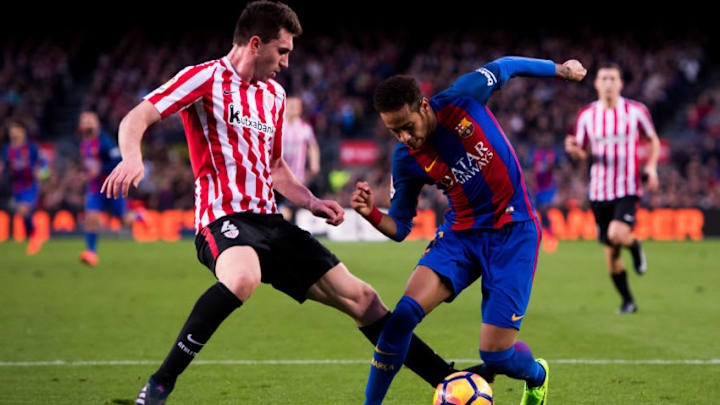 BARCELONA, SPAIN - FEBRUARY 04: Neymar Santos Jr (R) of FC Barcelona dribbles Aymeric Laporte (L) of Athletic Club during the La Liga match between FC Barcelona and Athletic Club at Camp Nou stadium on February 4, 2017 in Barcelona, Spain. (Photo by Alex Caparros/Getty Images)