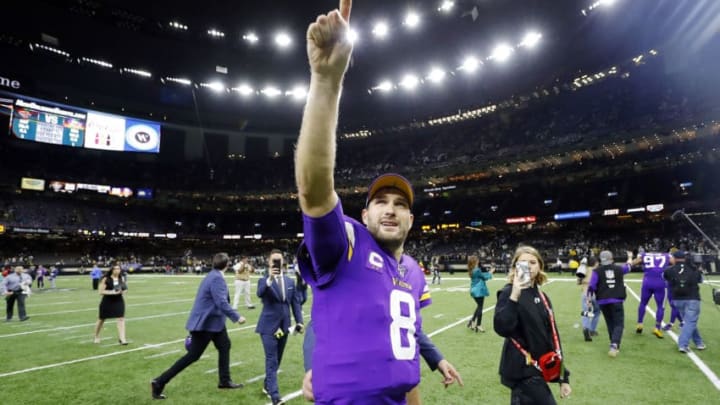 NEW ORLEANS, LOUISIANA - JANUARY 05: Kirk Cousins #8 of the Minnesota Vikings celebrates after defeating the New Orleans Saints 26-20 during overtime in the NFC Wild Card Playoff game at Mercedes Benz Superdome on January 05, 2020 in New Orleans, Louisiana. (Photo by Kevin C. Cox/Getty Images)