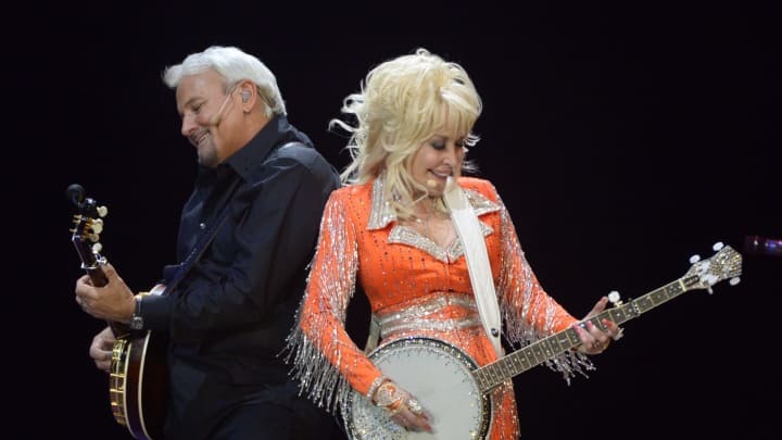 KNOXVILLE, TN – MAY 28: Dolly Parton performs during a concert to benefit Dolly’s Imagination Library & Dr. Robert F. Thomas Foundation at The University of Tennessee’s Thompson-Boling Arena on May 28, 2014, in Knoxville, Tennessee. (Photo by Rick Diamond/Getty Images)