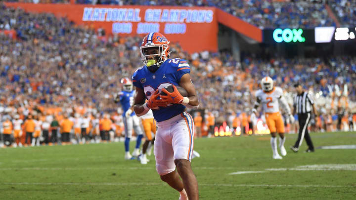 Florida running back Malik Davis (20) runs into the end zone for a touchdown during an NCAA football game against Florida at Ben Hill Griffin Stadium in Gainesville, Florida on Saturday, Sept. 25, 2021.Tennflorida0925 1443