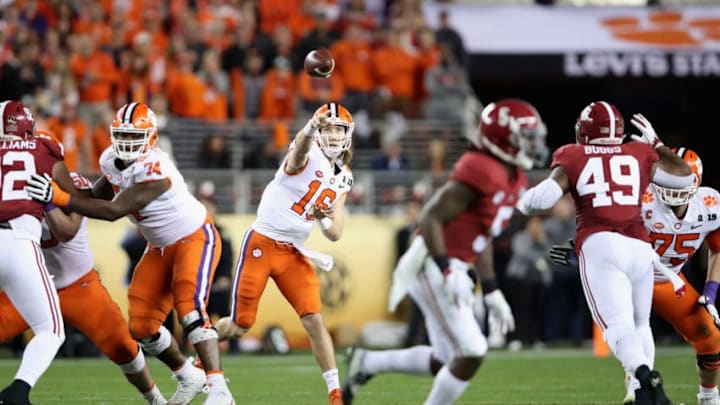 SANTA CLARA, CA - JANUARY 07: Trevor Lawrence #16 of the Clemson Tigers attempts a pass against the Alabama Crimson Tide in the CFP National Championship presented by AT&T at Levi's Stadium on January 7, 2019 in Santa Clara, California. (Photo by Christian Petersen/Getty Images)