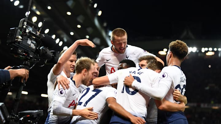 MANCHESTER, ENGLAND - AUGUST 27: Lucas Moura of Tottenham Hotspur (hidden) celebrates with team mates after scoring his second goal and his team's third goal during the Premier League match between Manchester United and Tottenham Hotspur at Old Trafford on August 27, 2018 in Manchester, United Kingdom. (Photo by Clive Mason/Getty Images)