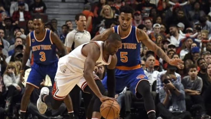 Nov 4, 2016; Chicago, IL, USA; Chicago Bulls guard Dwyane Wade (3) is defended by New York Knicks guard Courtney Lee (5) during the first quarter at the United Center. Mandatory Credit: David Banks-USA TODAY Sports