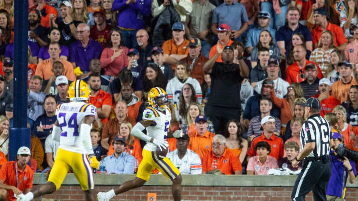 LSU Tigers safety Jay Ward (5) jogs into the end zone after scooping up an Auburn fumble as Auburn Tigers take on LSU Tigers at Jordan-Hare Stadium in Auburn, Ala., on Saturday, Oct. 1, 2022. Auburn Tigers lead LSU Tigers 17-14 at halftime.