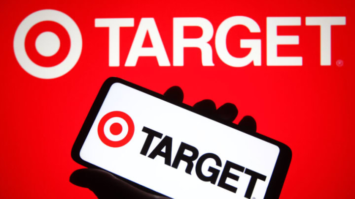 UKRAINE - 2021/11/20: In this photo illustration, Target Corporation logo seen on a smartphone and a pc screen. (Photo Illustration by Pavlo Gonchar/SOPA Images/LightRocket via Getty Images)