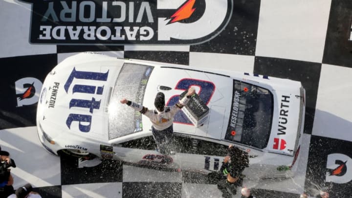 DAYTONA BEACH, FL - FEBRUARY 11: Brad Keselowski, driver of the #2 Miller Lite Ford, celebrates in Victory Lane after winning the Monster Energy NASCAR Cup Series Advance Auto Parts Clash at Daytona International Speedway on February 11, 2018 in Daytona Beach, Florida. (Photo by Jerry Markland/Getty Images)