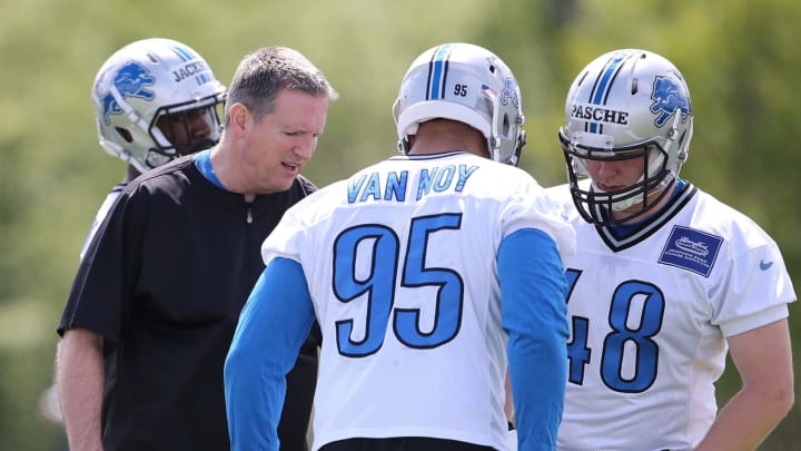 ALLEN PARK, MI – MAY 17: Detroit Lions linebacker coach Bill Sheridan gives instructions to Kyle Van Noy #95 and Brett Pasche #48 during Rookie Minicamp on May 17, 2014 in Allen Park, Michigan. (Photo by Leon Halip/Getty Images)