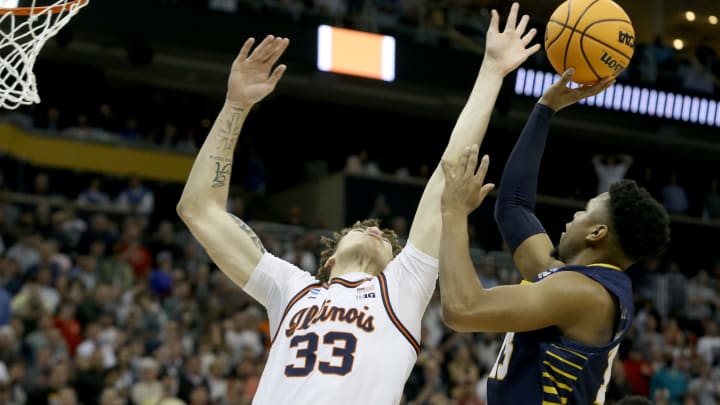 Mar 18, 2022; Pittsburgh, PA, USA; Chattanooga Mocs guard Malachi Smith (13) has his shot blocked late in the game by Illinois Fighting Illini forward Coleman Hawkins (33) during the first round of the 2022 NCAA Tournament at PPG Paints Arena. The Illini won 54-53. Mandatory Credit: Charles LeClaire-USA TODAY Sports
