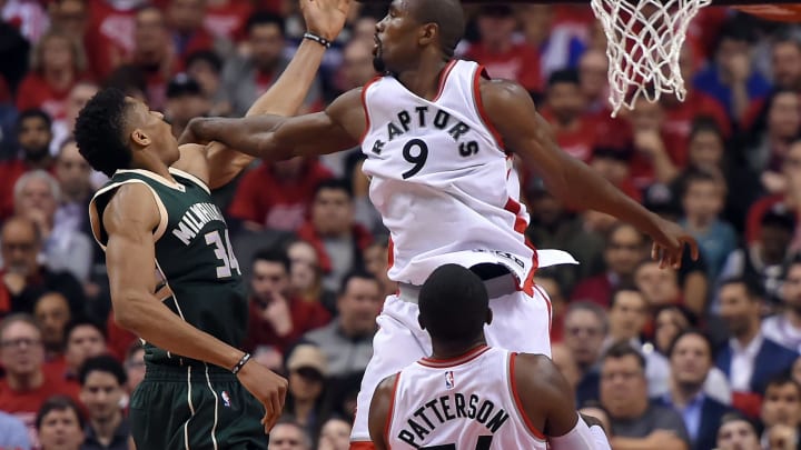 Apr 18, 2017; Toronto, Ontario, CAN; Milwaukee Bucks forward Giannis Antetokounmpo (34) shoots for a basket as Toronto Raptors forward Serge Ibaka (9) defends in game two of the first round of the 2017 NBA Playoffs at Air Canada Centre. The Raptors won 106-100. Mandatory Credit: Dan Hamilton-USA TODAY Sports