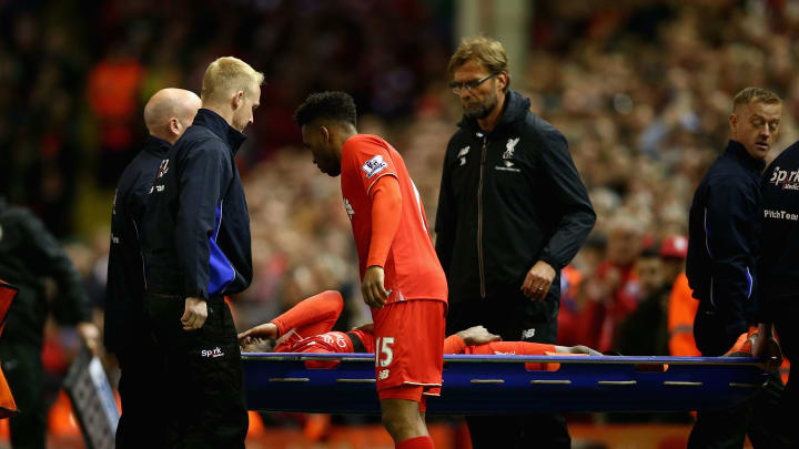 LIVERPOOL, ENGLAND – APRIL 20: Divock Origi of Liverpool leaves the field on a stretcher being replaced by Daniel Sturridge of Liverpool during the Barclays Premier League match between Liverpool and Everton at Anfield, April 20, 2016, Liverpool, England (Photo by Clive Brunskill/Getty Images)