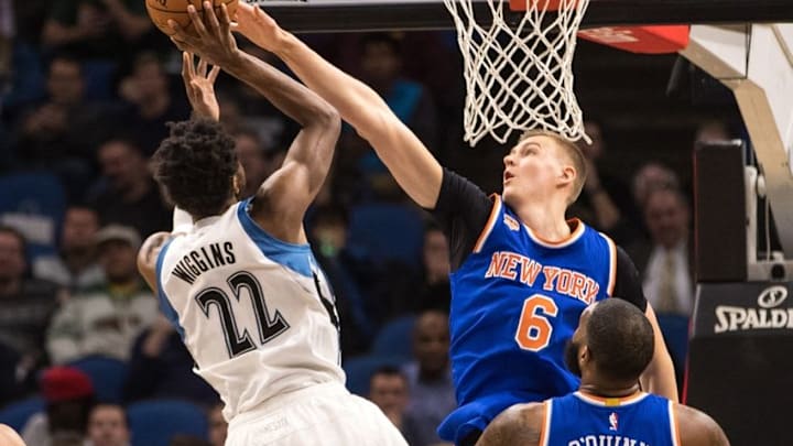 Nov 30, 2016; Minneapolis, MN, USA; Minnesota Timberwolves forward Andrew Wiggins (22) shoots over New York Knicks forward Kristaps Porzingis (6) during the first quarter at Target Center. Mandatory Credit: Brace Hemmelgarn-USA TODAY Sports