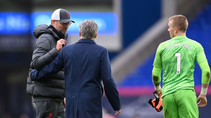 LIVERPOOL, ENGLAND - OCTOBER 17: Jurgen Klopp, Manager of Liverpool and Carlo Ancelotti, Manager of Everton talk following the Premier League match between Everton and Liverpool at Goodison Park on October 17, 2020 in Liverpool, England. Sporting stadiums around the UK remain under strict restrictions due to the Coronavirus Pandemic as Government social distancing laws prohibit fans inside venues resulting in games being played behind closed doors. (Photo by Laurence Griffiths/Getty Images)