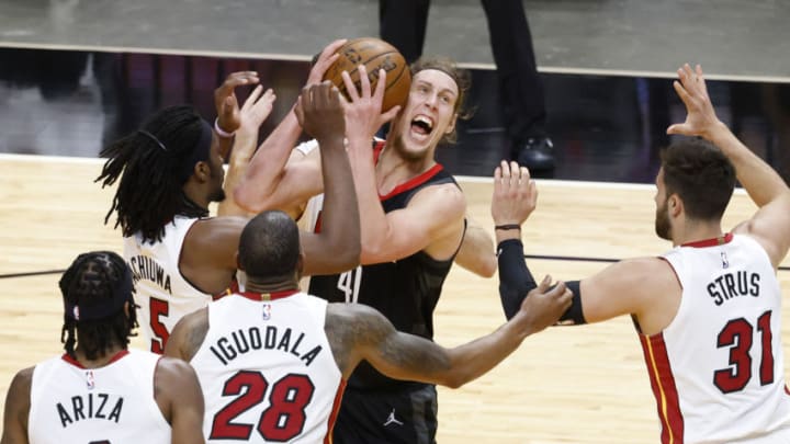 Houston Rockets forward Kelly Olynyk (41) is defended by Miami Heat players forward Precious Achiuwa (5), forward Trevor Arizam guard Andre Iguodada and guard Max Strus (31)(Rhona Wise-USA TODAY Sports)