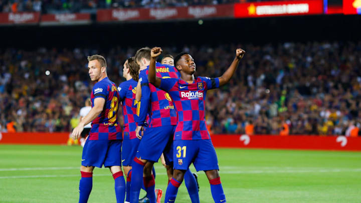 BARCELONA, SPAIN - SEPTEMBER 14: Ansu Fati of FC Barcelona celebrates scoring his side's first goal in the 2nd minute during the Liga match between FC Barcelona and Valencia CF at Camp Nou on September 14, 2019 in Barcelona, Spain. (Photo by Eric Alonso/MB Media/Getty Images)