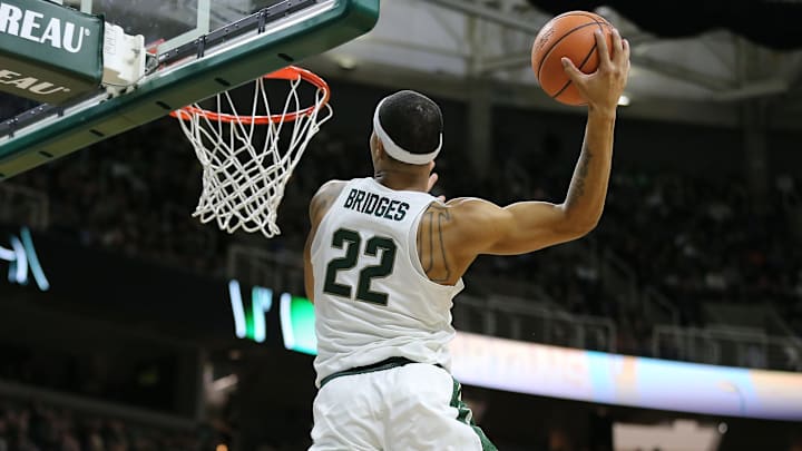 EAST LANSING, MI – DECEMBER 21: Miles Bridges #22 of the Michigan State Spartans slam dunk the basketball against the Long Beach State 49ers at Breslin Center on December 21, 2017 in East Lansing, Michigan. (Photo by Rey Del Rio/Getty Images)