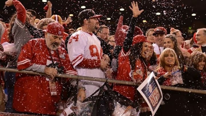 December 23, 2013; San Francisco, CA, USA; San Francisco 49ers fans celebrate after the 49ers made a field goal during the first quarter in the final regular season game against the Atlanta Falcons at Candlestick Park. Mandatory Credit: Kyle Terada-USA TODAY Sports