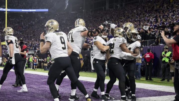 MINNEAPOLIS, MN - JANUARY 14: Members of the New Orleans Saints celebrate a game-tying touchdown from quarterback Drew Brees