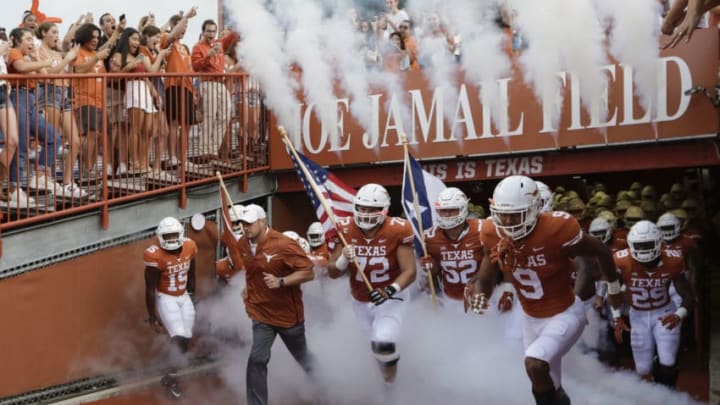 AUSTIN, TX - SEPTEMBER 08: Head coach Tom Herman of the Texas Longhorns leads the team on to the field before the game against the Tulsa Golden Hurricane at Darrell K Royal-Texas Memorial Stadium on September 8, 2018 in Austin, Texas. (Photo by Tim Warner/Getty Images)