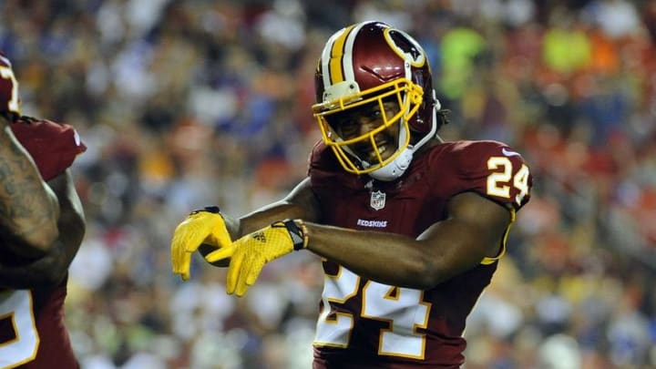 Washington Redskins defensive back Josh Norman (24) celebrates after a tackle against the Buffalo Bills during the first half at FedEx Field.