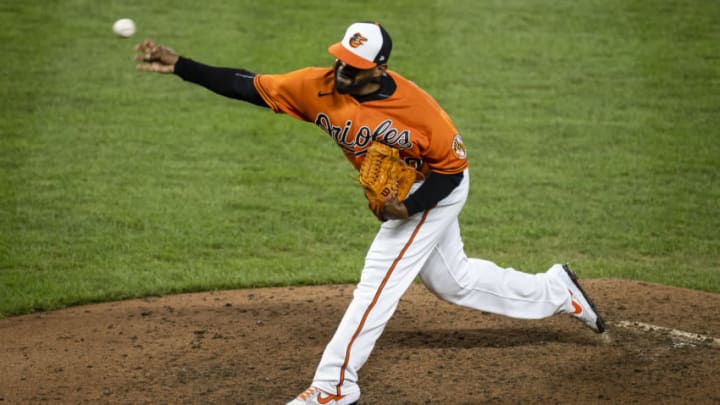 BALTIMORE, MD - AUGUST 22: Mychal Givens #60 of the Baltimore Orioles pitches against the Boston Red Sox during the seventh inning at Oriole Park at Camden Yards on August 22, 2020 in Baltimore, Maryland. (Photo by Scott Taetsch/Getty Images)
