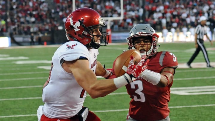 Sep 3, 2016; Pullman, WA, USA; Eastern Washington Eagles wide receiver Cooper Kupp (10) makes a touchdown catch against Washington State Cougars defensive lineman Samson Ebukam (3) during the second half at Martin Stadium. The Eagles won 45-42. Mandatory Credit: James Snook-USA TODAY Sports