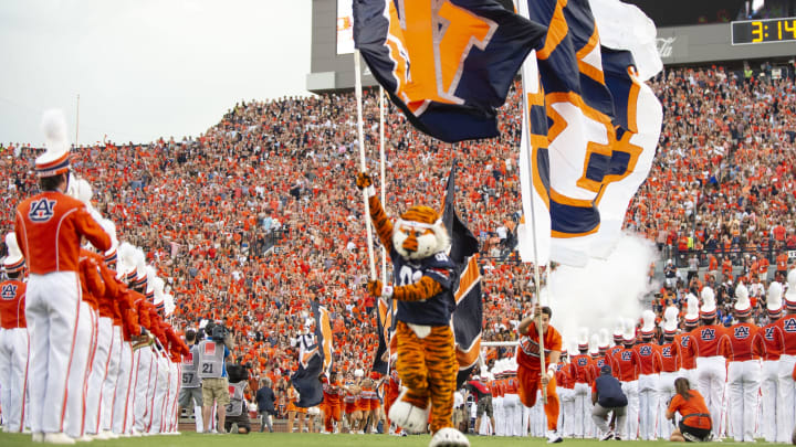 The Auburn Tigers cheerleaders and mascot Aubie (Photo by Michael Chang/Getty Images)
