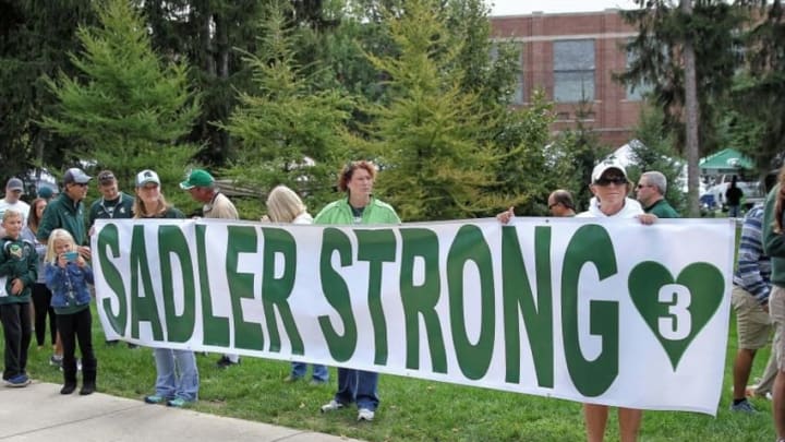 Sep 24, 2016; East Lansing, MI, USA; Fans display a Sadler Strong banner honoring Mike Sadler former punter for Michigan State Spartans who was killed in a car accident over the summer prior to a game against the Wisconsin Badgers at Spartan Stadium. Mandatory Credit: Mike Carter-USA TODAY Sports