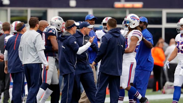 02 October 2016: Both teams get involved after Buffalo Bills safety Robert Blanton (26) hit New England Patriots quarterback Jacoby Brissett (7) during warm up. The Buffalo Bills defeated the New England Patriots 16-0 in a regular season NFL game at Gillette Stadium in Foxborough, Massachusetts. (Photo by Fred Kfoury III/Icon Sportswire via Getty Images)