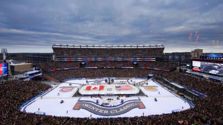 Jan 1, 2016; Foxborough, MA, USA; A general view of Gillette Stadium during the National Anthem before the Winter Classic hockey game at Gillette Stadium. Mandatory Credit: Greg M. Cooper-USA TODAY Sports