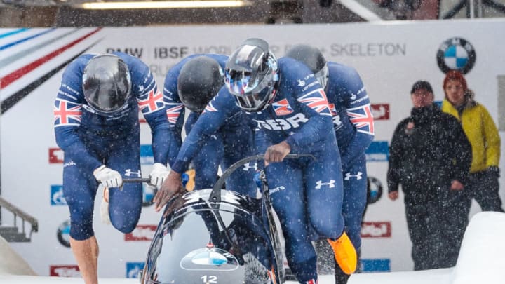 Pilot Lamin Deen with Ben Simons, Bruce Tasker and Joel Fearon of Great Britain compete during the first run of the four-man Bobsleigh event within the 2017-2018 IBSF World Cup Bobsled and Skeleton series on December 17, 2017 at the Olympic Bobsleigh Run in Innsbruck/Igls ahead of the 2018 Olympic Winter Games, which will be held in February in South Korea. / AFP PHOTO / APA / Johann GRODER / Austria OUT (Photo credit should read JOHANN GRODER/AFP/Getty Images)
