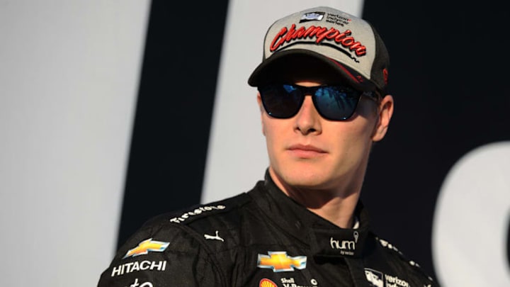 SONOMA, CA - SEPTEMBER 17: Josef Newgarden, driver of the #2 hum by Verizon Chevrolet, stands on the podium after winning the Verizon IndyCar championship following the Verizon IndyCar Series GoPro Grand Prix of Sonoma at Sonoma Raceway on September 17, 2017 in Sonoma, California. (Photo by Robert Reiners/Getty Images)