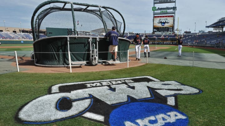 OMAHA, NE - JUNE 23: The Virginia Cavaliers take batting practice before game one of the College World Series Championship against the Vanderbilt Commodores on June 23, 2014 at TD Ameritrade Park in Omaha, Nebraska. (Photo by Peter Aiken/Getty Images)