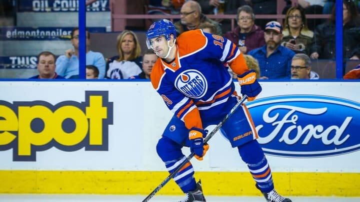 Feb 13, 2016; Edmonton, Alberta, CAN; Edmonton Oilers defenseman Justin Schultz (19) controls the puck against the Winnipeg Jets during the first period at Rexall Place. Winnipeg Jets won 2-1. Mandatory Credit: Sergei Belski-USA TODAY Sports