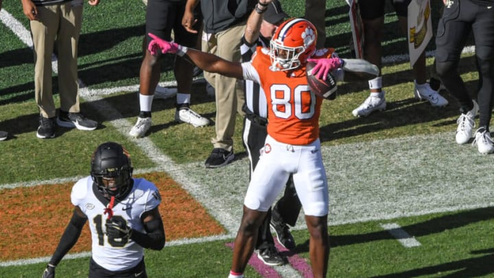 Oct 7, 2023; Clemson, South Carolina, USA; Clemson wide receiver Beaux Collins (80) reacts after catching a pass near Wake Forest defensive back Kenneth Dicks III (10) during the second quarter at Memorial Stadium. Mandatory Credit: Ken Ruinard-USA TODAY Sports