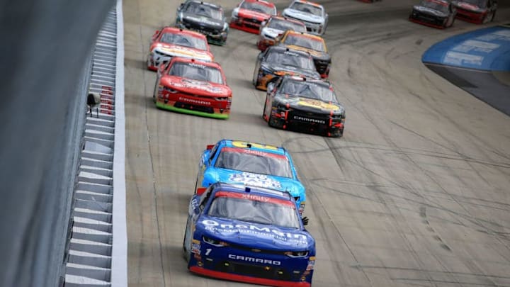 DOVER, DE - SEPTEMBER 30: Elliott Sadler, driver of the #1 OneMain Financial Chevrolet, leads a pack of cars during the NASCAR XFINITY Series "Use Your Melon. Drive Sober 200" at Dover International Speedway on September 30, 2017 in Dover, Delaware. (Photo by Chris Trotman/Getty Images)