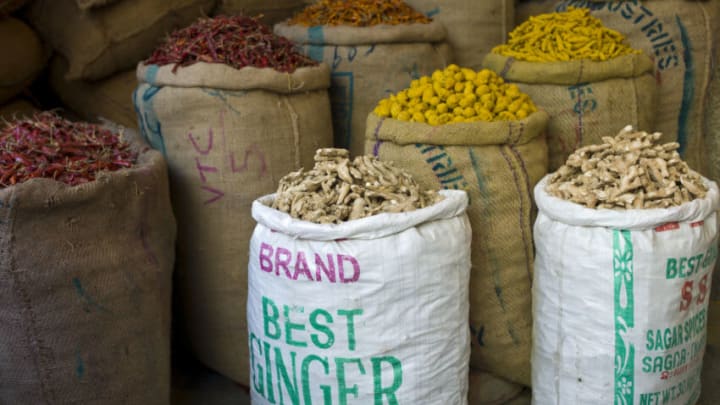 INDIA - FEBRUARY 28: Red chillies, turmeric and ginger root on sale at Khari Baoli spice and dried foods market, Old Delhi, India (Photo by Tim Graham/Getty Images)