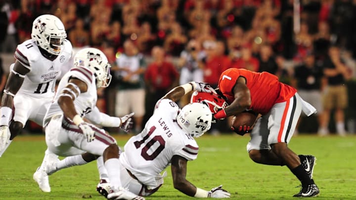 ATHENS, GA – SEPTEMBER 23: D’Andre Swift #7 of the Georgia Bulldogs is tackled by Leo Lewis #10 of the Mississippi State Bulldogs at Sanford Stadium on September 23, 2017 in Athens, Georgia. (Photo by Scott Cunningham/Getty Images)