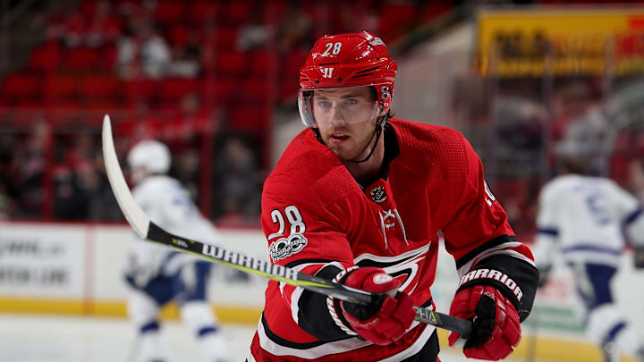 RALEIGH, NC – OCTOBER 24: Elias Lindholm #28 of the Carolina Hurricanes warms up during pregame prior to his 300th NHL game against the Tampa Bay Lightning on October 24, 2017 at PNC Arena in Raleigh, North Carolina. (Photo by Gregg Forwerck/NHLI via Getty Images)