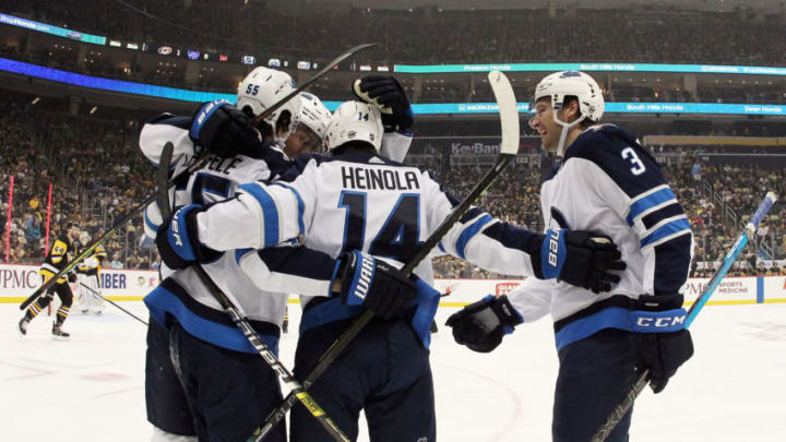 Winnipeg Jets, Mark Scheifele, Tucker Poolman, Ville Heinola (Mandatory Credit: Charles LeClaire-USA TODAY Sports)