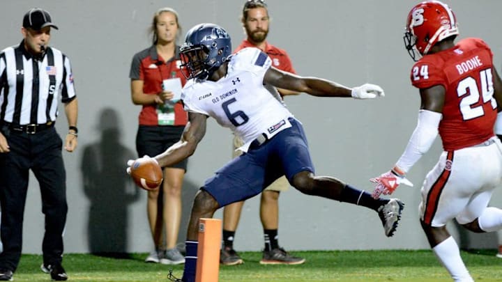 Sep 17, 2016; Raleigh, NC, USA; Old Dominion Monarchs wide receiver Zach Pascal (6) scores a touchdown during the second half against the North Carolina State Wolfpack at Carter Finley Stadium. The Wolfpack won 49-22. Mandatory Credit: Rob Kinnan-USA TODAY Sports