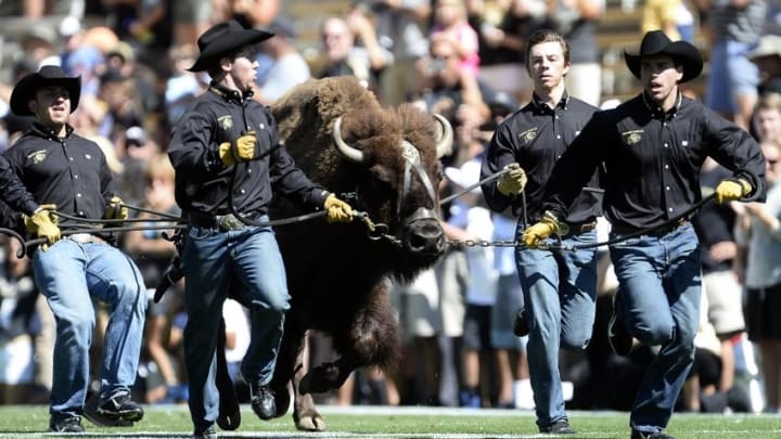 Sep 12, 2015; Boulder, CO, USA; Colorado Buffaloes mascot Ralphie the Buffalo runs onto the field before the game against the Massachusetts Minutemen at Folsom Field. Mandatory Credit: Ron Chenoy-USA TODAY Sports